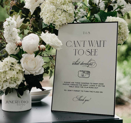 modern retro disposable camera sign digital template with camera illustration next to a white flowers vase